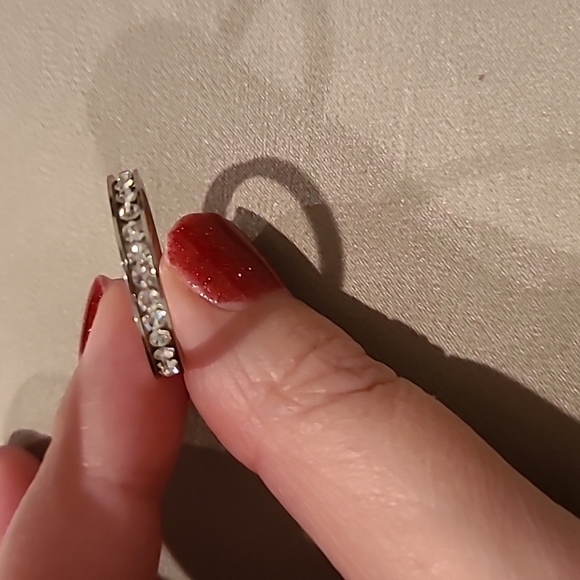 Eternity style cubic zirconia stainless steel channel set stones ring - Picture 6 of 7